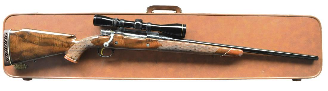 BROWNING MEDALLION GRADE FN HI-POWER MAGNUM: RIFLE WITH CASE & SCOPE. Cal. 375 H&H. S# 9X49521. The 24 1/4" medium weight tapered bbl. has cal., S# & "MADE IN BELGIUM" at right rear. FN short extractor magnum action w/ polished bolt, side safety