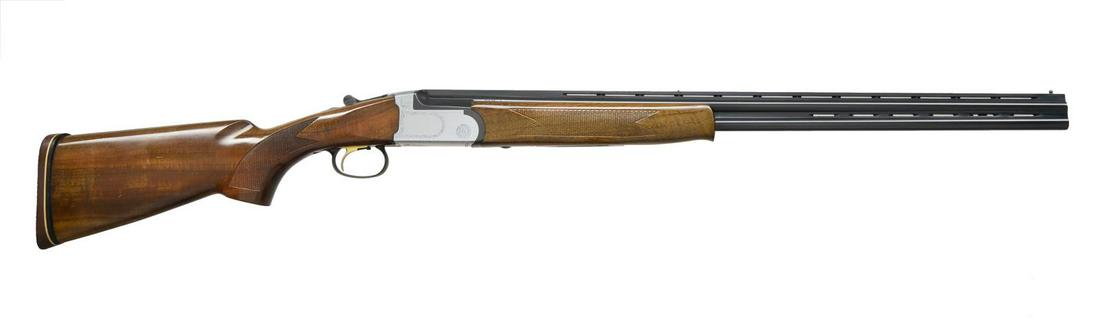 AMERICAN ARMS SILVER 1 O/U SHOTGUN.: Cal. 410, 3". S# A80524. Bbls. 26" VR w/ ventilated side ribs. Brass front & mid beads. Fixed Mod. & Full chokes. Satin finished boxlock action w/ light coverage of scroll ornamentation. Gold finished