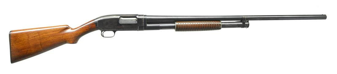 WINCHESTER MODEL 12 PUMP SHOTGUN.: Cal. 12 Ga. S# 605410. Bbl. 30" plain of Nickel Steel. Fixed full choke. Steel bead. Sm. rnd. grooved forearm & early style pistol grip walnut stock w/ original buttplate. 1930 Mfg. CONDITION: bbl. & 