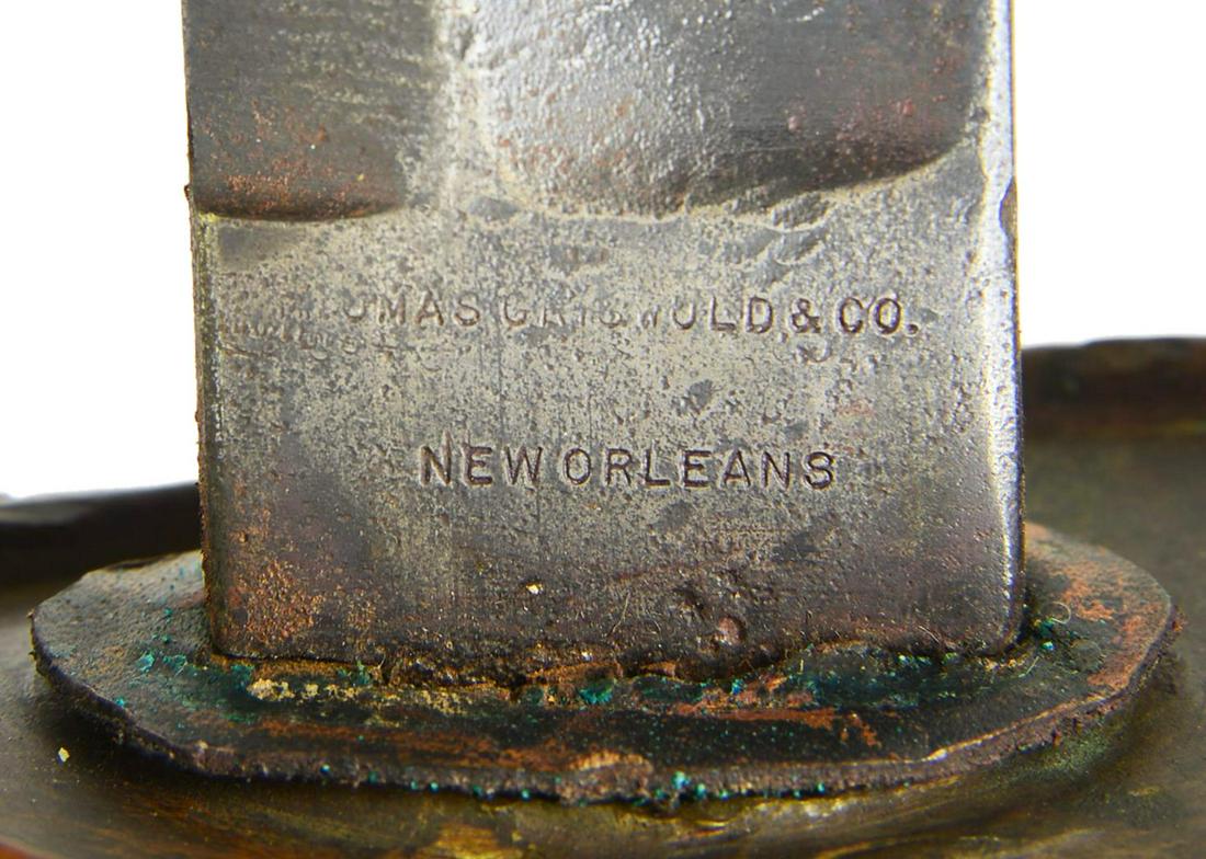 THOMAS GRISWOLD CAVALRY OFFICER SABER.: 41” Overall, 35” blade w/ rare variant maker marking in 2 straight lines â€œTHOMAS GRISWOLD & CO. / NEW ORLEANS”. This marking is absolutely original & is seen on few other examp