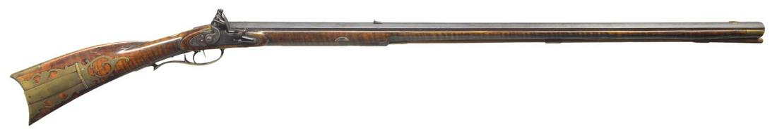 RARE JONATHAN WETZEL SNYDER COUNTY KENTUCKY RIFLE.: Cal. 52 rifled bore. NSN. Bbl. 37 1/4" full oct. Overall length 51". This curly maple stocked rifle has a 4 piece brass patchbox w/ 5 piercings. Engraved English original flintlock. â€œJ WETZEL&rd