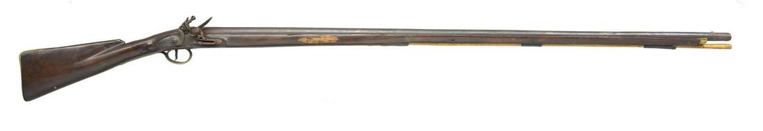 18TH CENTURY FLINTLOCK FOWLER.: Cal. 58. NSN. Bbl. 46 1/2" rnd., totally unmarked, brass mounted, late 18th-early 19th century style. 62" Overall. CONDITION: fair to good overall as restored. Inset brass front sight, nosecap, tang s