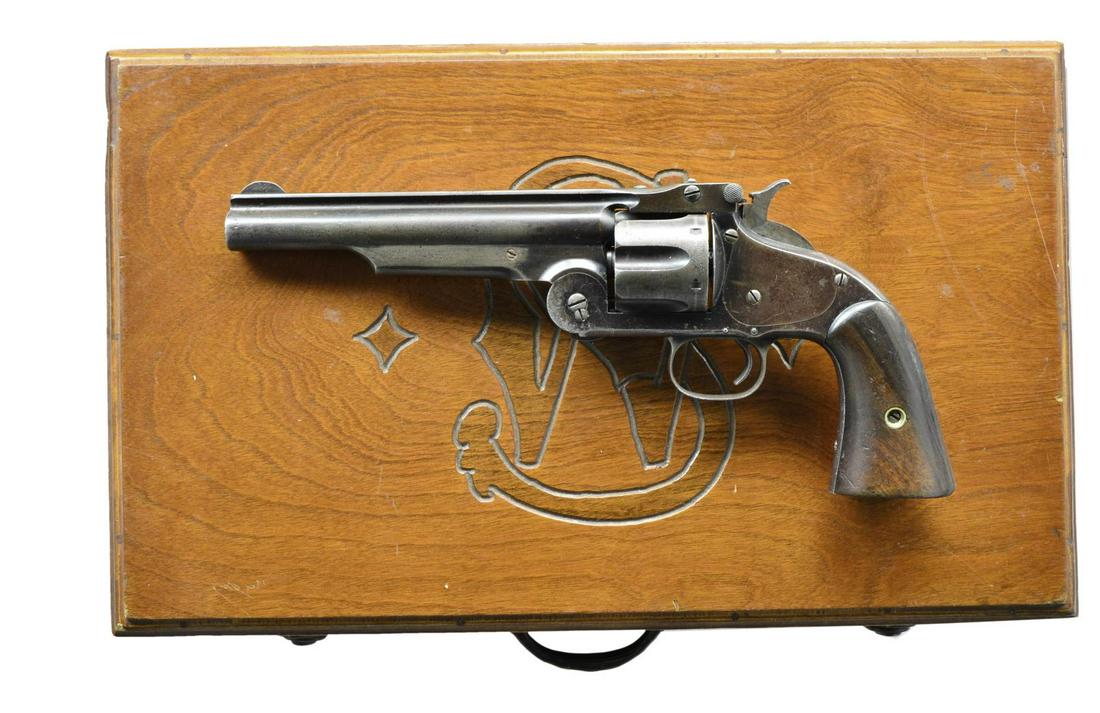 SMITH & WESSON NO. 3 SECOND MODEL AMERICAN SA: REVOLVER. Cal. 44 S&W. S# 15507. Bbl. altered to 6 1/4" w/ rib. Pinned semi circular blade front sight. 6 Shot fluted cyl. Top break action. Identifying features include the notch at top of the hammer