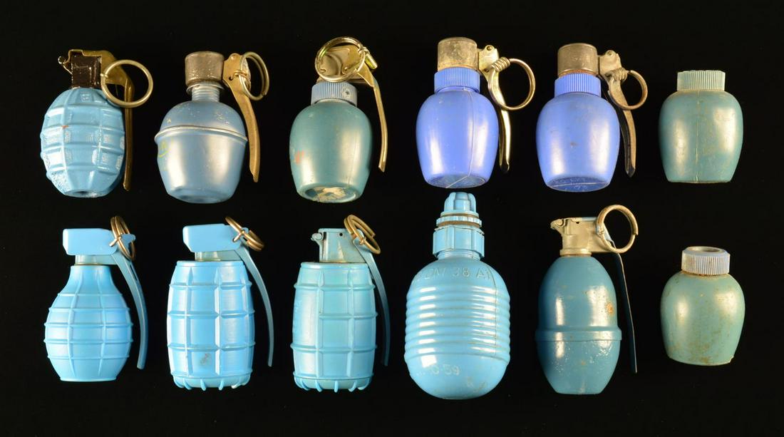 12 INERT BLUE PAINTED PRACTICE GRENADES.: FRANCE: 6 M37 "jug" style (2 w/out fuses), 1 "ELV" marked F1 style. GERMAN: 1 - DM58, 2 - DM78 & 1 - DM 38 w/ broken top. US: 1 M26 style. CONDITION: good to very good overall. (02-16247-3/MD). $300-6