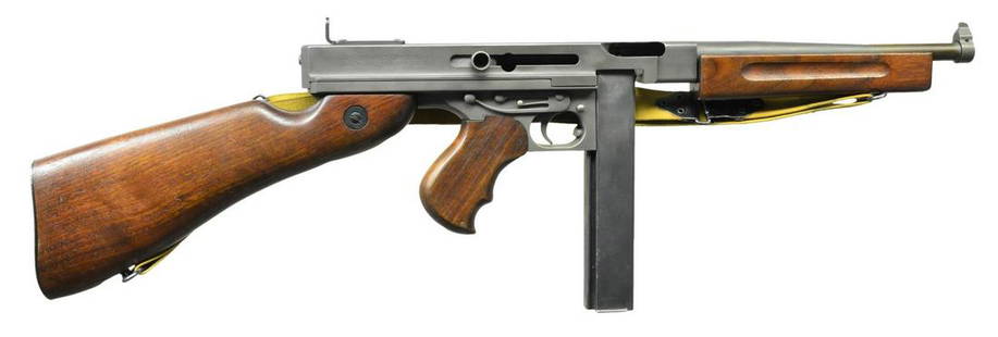 AUTO-ORDNANCE MODEL M1 THOMPSON SMG.: Cal. 45 ACP. S# M389A. Bbl. 10.5". A classic â€œTommy Gun" in fantastic condition. Even parkerized gray finish on all exposed metal surfaces w/ classic hardwood furniture. Above the horizontal