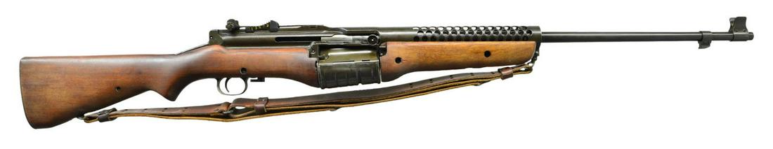 HIGH CONDITION DUTCH CONTRACT MODEL 1941 JOHNSON: SEMI AUTO RIFLE. Cal. 30-06. S# 4749. Standard configuration. The 22 3/4" bbl. with correct front sight and bayonet lug stamped "J.A 30-06" on barrel shank and with number "6016N". Matching number is