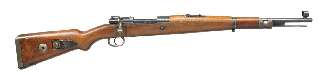 "DOT 1941" MARKED G33/40 CARBINE.: Cal. 8mm Mauser. S# 9113a. Standard issue w/ 19 1/2" bbl. Standard sights (front w/ cover). Special lightweight action has all correct marks & proofs on receiver. All numbers match. Walnut stock has a