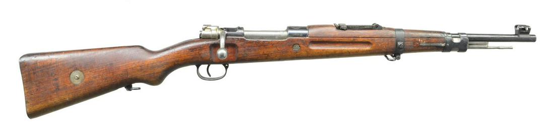 PERSIAN MODEL 30 BOLT ACTION CARBINE.: Cal. 8mm Mauser. S# 2569 (Farsi). Bbl. 17 7/8". These carbines were manufactured for Persia by BRNO in Czechoslovakia. Receiver ring marked on top w/ Persian lion crest. Marked on right side w/ Persia