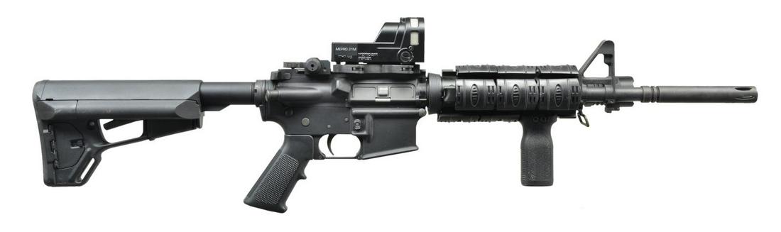 OLYMPIC ARMS PCR OO CARBINE WITH ACCESSORIES.: Cal. 5.56mm. S# KX4829. Bbl. 16" Mfg. Olympic Arms. Carbine configuration black rifle w/ a 5.5" flash hider that is permanently attached w/ an overall length of 16" to emulate an XM177 type w/out the 