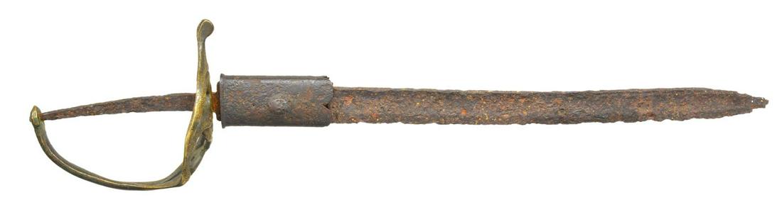 RELIC CONFEDERATE SABER.: 23" Overall. 7" Heavily rusted blade w/ iron throat & frog button frozen in place. Brass hilt of Nashville style w/ cast letters â€œCSA” on bottom of guard. CONDITION: fair overall, heavily 
