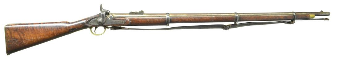 BELGIAN COPY OF A BRITISH 1853 RIFLE MUSKET.: Cal. 577. NSN. Many of these weapons were supplied to the Confederacy. This musket has 39" rnd. bbl. w/ Nock form at rear. Belgian proofs stamped in front of percussion bolster, a star over "JG" is on