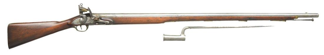 GOOD 2ND MODEL BROWN BESS MUSKET BY PARKES: WITH BAYONET. Cal. 79. NSN. Bbl. 42 1/8", has remnants of London (?) proofs on breech end. Lock w/ slightly arched round bodied plate has integral pan, bridled frizzen & feather spring w/ foliate fini