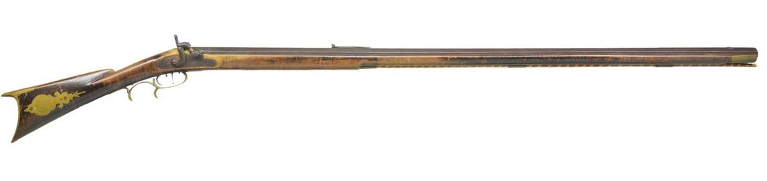 LATE RIFLE ATTRIBUTED TO SAMUEL MORRISON.: Cal. 45 smooth bore. Bbl. 44 1/2" full oct. unsigned. Dbl. set triggers & 5 1/4" long toe plate. Rifle has a brass cap box & 5 1/2" brass saddle plate. Curly maple stock has an upper Susquehanna half 