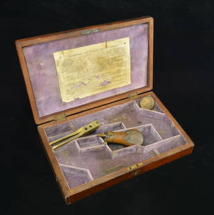 COLT POCKET MODEL 1849 MAHOGANY DOUBLE PISTOL: CASE. Mid-19th century. Finely appointed case w/ original paper instruction sheet on lid interior, retains original compartmented interior w/ lavender velvet liner. It is offered w/ bullet mold,