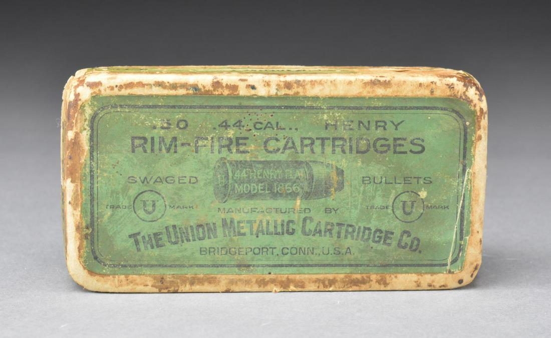 RARE & DESIRABLE BOX OF 44 HENRY RIMFIRE: CARTRIDGES MANUFACTURED BY UNION METALLIC CARTRIDGE CO. Full box of 50 copper cased flat nose lead bullets. Cartridges are head stamped "U". 2 Piece tan box w/ green & orange labels. Box has been open