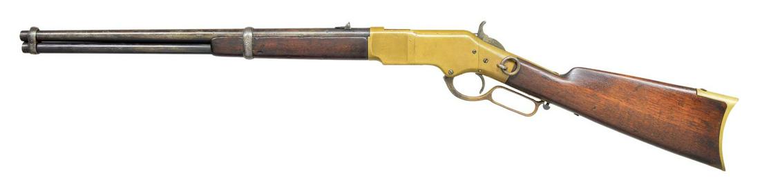 WINCHESTER 1866 3RD MODEL LEVER ACTION SRC.: Cal. 44 CF. S# 77174. Bbl. 20" carbine style. Mag. band mounted front sight w/ folding leaf rear sight. Full length mag. Brass action is stamped "000" on right side below hammer. Left side is fitted w
