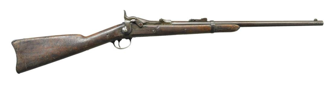 SPRINGFIELD 1873 CUSTER RANGE TRAPDOOR SRC.: Cal. 45-70. S# 3166. Bbl. 22". Blade front sight w/ 1873 rear sight having 500 yd. graduated base & 1,200 yd. graduated leaf. Model 1873 high arch breech block w/ eagles head, crossed sabers & "US" ma