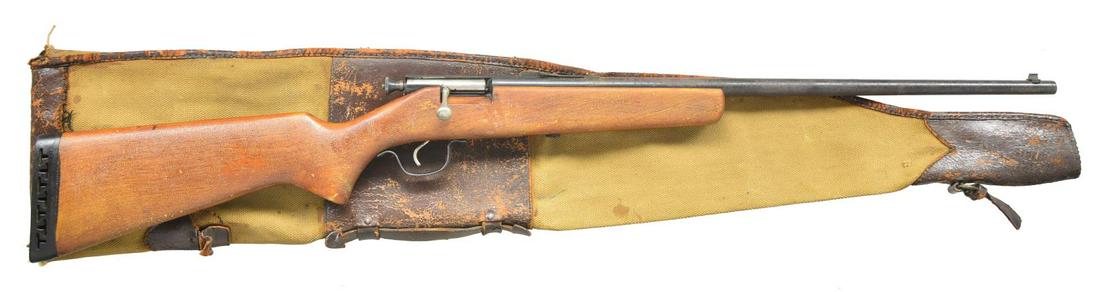 SPRINGFIELD MODEL 15 SINGLE SHOT BOLT ACTION RIFLE: WITH CARRYING CASE. Cal. 22. NSN. This low priced rifle has 22" bbl. Rear portion milled to accept simple bolt w/ polished body. Birchwood pistol grip stock is fitted w/ black recoil pad. UNATTACHED A