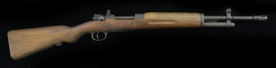 COLD WAR SPANISH LA CORUNA FR8 BOLT ACTION RIFLE.: Cal. 308 Win. S# FR8-43044 (1956). CAI import marked 19" bbl. including flash suppressor. Accessory storage tube under bbl. Hooded post front sight & adj. rear sight. S# matches on bolt. Matte bead bl