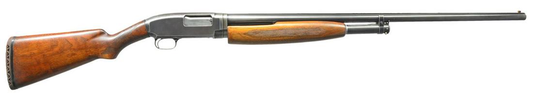 WINCHESTER MODEL 12 TOURNAMENT PUMP SHOTGUN.: Cal. 12 Ga. S# 413472. Bbl. 32" nickel steel w/ solid rib & fixed full choke. Orange fiber optic replacement front sight w/ aluminum mid bead. Walnut extension forearm w/ 3 diamond checkering on botto