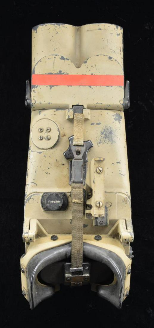 WWII GERMAN CARL ZEISS, JENA (blc) 12x60 ANTI: AIRCRAFT SPOTTING BINOCULARS. S# 229612 Overall length: 16" including an attached 5" long sun shade. Tan finish w/ red stripe on sun shade. Eye piece has face cups for seating head along w/ cover for