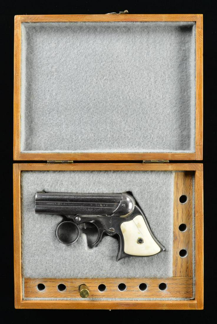 REMINGTON ELLIOT'S 32 RF RING TRIGGER PEPPERBOX: DERRINGER. Cal. 32 RF. S# 22087. Bbls. 3 3/8" clustered in group of 4 w/ matching S#; rotating firing pin. Mfg. 1863-1888; approx. 25,000 units. Less popular 22 RF model w/ 5 bbls. saw 10,000 mfg. Fra