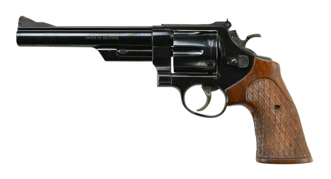 BEAUTIFUL SMITH & WESSON MODEL 29-2 REVOLVER.: Cal. 44MAG. S# S318747. Bbl. 6.5" Mfg. 1968-1969. Double action "N" frame revolver. Shrouded extractor rod. Fluted, 6-shot cylinder. Blued finish w/ serrated flat top on frame & barrel. Red ramp inser