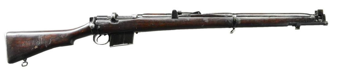 ISHAPORE 2A1 LEE ENFIELD RIFLE.: Cal. 7.62x51 NATO. S #J1307. Bbl. 25 1/2". Magazine is mismatched, other parts have matching numbers. Right side of receiver has import marking. Right side of socket marked "RIFLE 7.62MM 2A1 R.F.I. 19
