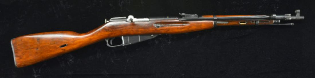 WWII SOVIET 1943 DATED IZHVESK ARSENAL MODEL 44: BOLT ACTION CARBINE. S# 7.62x54R. Importer S# 44-1741 (Soviet S# HE4345). Bbl. 20 1/2" w/ hooded post front sight, 1,000m tangent rear sight & folding 14" spike bayonet. Matching numbers on bolt, mag.