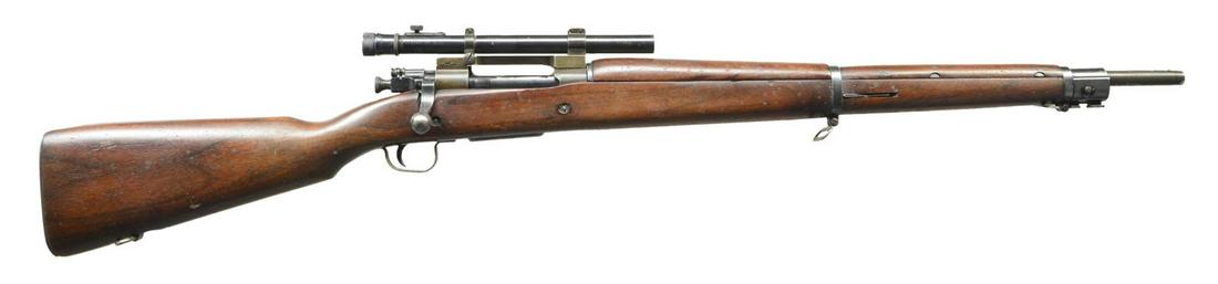 VERY DESIREABLE CORRECT U.S. WWII REMINGTON MODEL: 1903 A-4 BOLT ACTION SNIPER RIFLE W/ MODEL 330 WEAVER TELESCOPIC SIGHT. Cal. 30-06. Ser. #4997429. Bbl. 24". Bbl. is marked behind sight cuts "RA" "flaming bomb" & "1-44". Receiver has correct offset