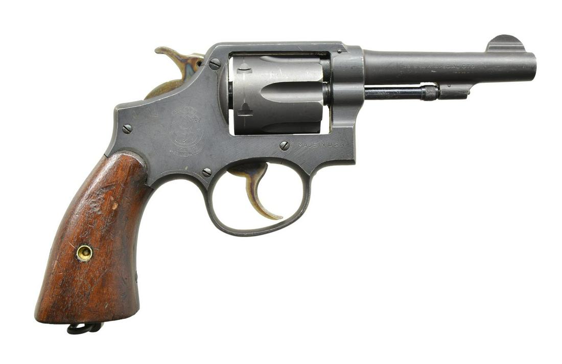 SMITH & WESSON U.S. PROPERTY MARKED VICTORY MODEL: REVOLVER. Cal. 38 S&W Spl. S# V509272. Bbl. 4" pinned with fixed sights. Top of frame is marked with the US Property markings & "G.H.D." inspector proofing. Case colored trigger & hammer. Smooth 2 pie