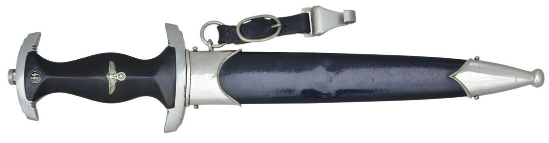 WWII GERMAN SS DAGGER.: Overall length: 14 9/16". Blade is etched, "Meine Ehre Heisst Treue"on the front and is marked, "CARL EICKHORN (squirrel) C.E. SOLINGEN" on the reverse. Nickel pommel and crossguard marked on the reve