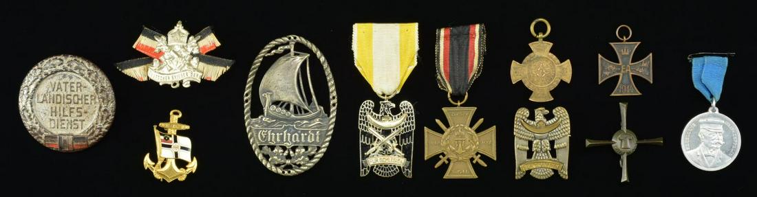 PRE WWII GERMAN MEDALS & BADGES.: This lot includes an Order of the Silesian Eagle, 1st Class. / 1 Order of the Silesian Eagle, 2nd Class with original ribbon. / A 1914-18 Naval Service Cross with swords. / A 1909 Graf Zeppelin medal