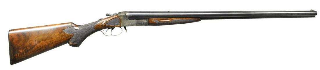 HIGH GRADE SMALL GAUGE DRILLING BY THE THREE: BARREL GUN CO. OF WHEELING, WEST VIRGINIA. Cal. 16 Ga., 2 1/2" / 32-40. S# 1346. The 28" bbls. have slightly raised full length matted rib fitted with unique elevation adjustable rear sight which fold
