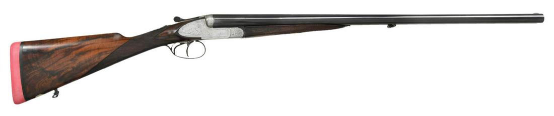 SIDEPLATED BOXLOCK SHOTGUN BY F. JACQUEMIN OF: LIEGE WITH GAME SCENE ENGRAVING. Cal. 12 Ga., 2 3/4". S# N.702. The 26 3/4" dovetailed bbls. w/ matted game rib are engraved w/ maker's name and address on tops. Bbl. flats are stamped w/ pre 1922 Bel