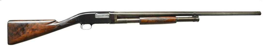WINCHESTER MODEL 1912 TOURNAMENT STYLE PUMP: SHOTGUN. Cal. 12 Ga. S# 189918. Bbl. 30" of nickel steel with solid rib, steel bead & fixed Mod. choke. Small round slide handle & straight grip stock of fancy walnut with tournament grade factory che