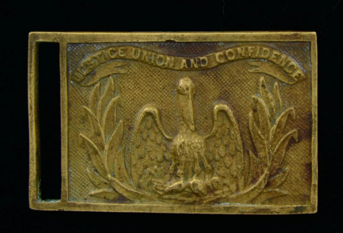 CIVIL WAR ERA LOUISIANA SWORD BELT PLATE.: 79 x 50mm. This is an interesting well made sword belt buckle listed in various references as wartime due to motto: "JUSTICE UNION AND CONFIDENCE". Postwar buckles have motto with "UNION" first and ar