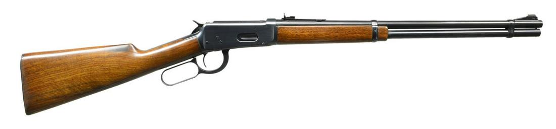 WINCHESTER MODEL 94 PRE WWII LEVER ACTION CARBINE: Cal. 30 WCF (30-30). S# 1167863. Bbl. 20" with ramp mounted bead front sight & sporting rear sight. Full length mag. Post war short wood walnut forearm. Original walnut stock with horizontal groove st