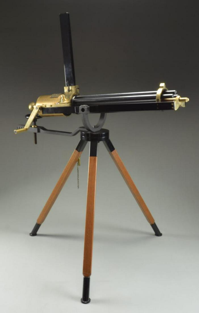 BATTERY GUN COMPANY 1862 BLACK POWDER GATLING GUN.: Cal. 357 Black Powder. S# 0309. Bbl. 28”. A full scale, functional reproduction of the iconic 1862 Battery Gun. These guns boasted a large round brass receiver with an exposed 6-barrel cluster. 