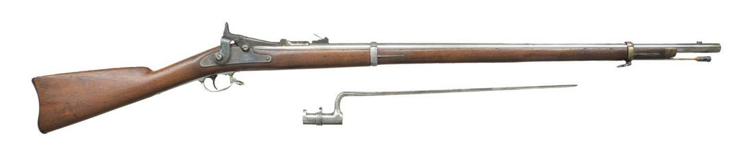 US SPRINGFIELD MODEL 1866 2ND ALLIN TRAPDOOR: SINGLE SHOT RIFLE. Cal. 50-70. NSN. Bbl. shortened to 32 7/8" with barleycorn front sight and 500 yard rear sight having 1 broken leaf. 1866 Dated breechblock with eagles head. 1864 Dated Springfield 