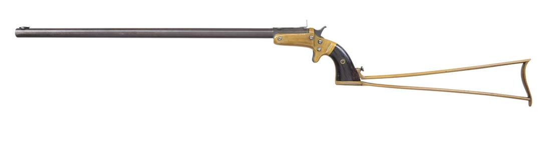 J. STEVENS FIRST ISSUE NEW MODEL POCKET RIFLE.: Cal. 32 RF. S# 279. Bbl. 18" round with octagon shank. Base only for globe front sight with peep rear sight missing adjustment screw. Brass action has circular sideplate, spur trigger and firing pin i