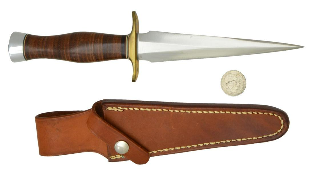 RANDALL MADE MODEL 13 SMALL ARKANSAS TOOTHPICK: KNIFE. Overall: 10 3/4". Dbl. edged 6" blade. Brass dbl. hilt. Leather handle. Duralumin butt cap. UNATTACHED ACCESSORIES: "13 6" marked Randall Knives brown leather sheath. CONDITION: Very good w/ re