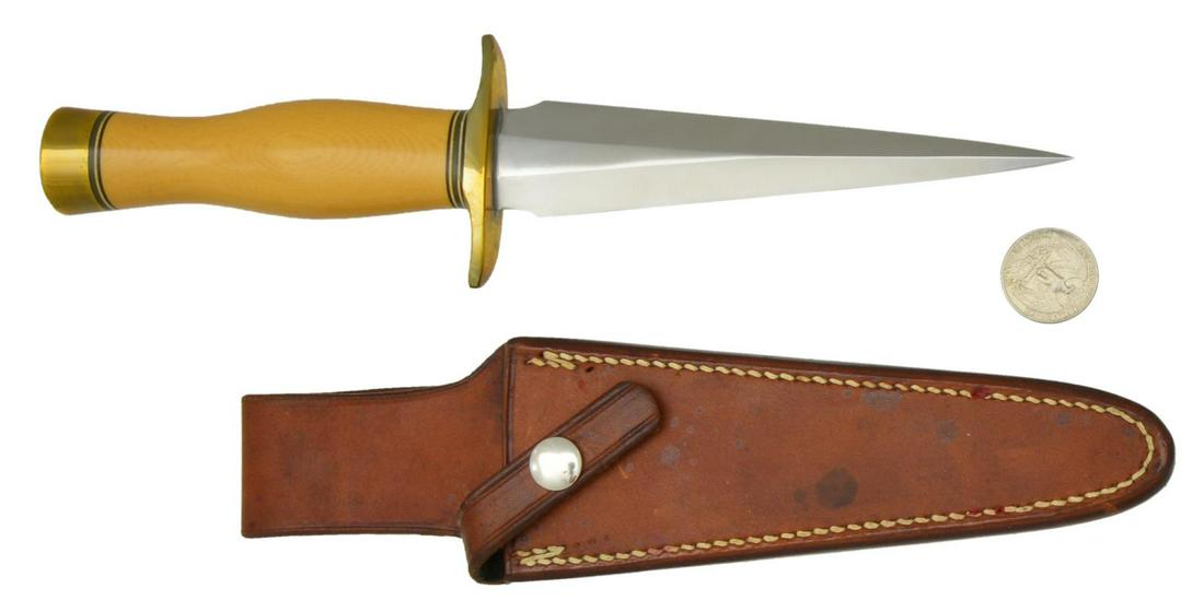 RANDALL MADE 13 SMALL ARKANSAS TOOTHPICK KNIFE: Overall length: 10". Toothpick 6" blade. Antique gold colored hilt & buttcap. Micarta grip. UNATTACHED ACCESSORIES: "13 6" mar ked Randall Made brown leather sheath along w/ Randall Made zippered case