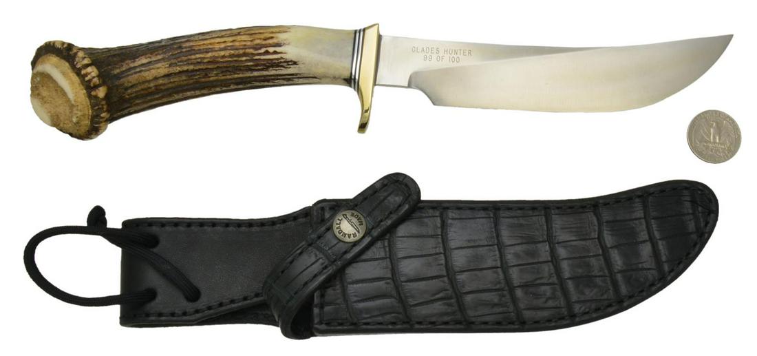 RARE #99 of 100 GLADES HUNTER RANDALL MADE: MODEL 4 KNIFE. Overall: 12". Stainless steel 6" blade w/ thumb notches & engraved on right side " GLADES HUNTER / 99 OF 100". Nickel silver single hilt. Sambar deer crown antler handle. UNATTACHED ACC