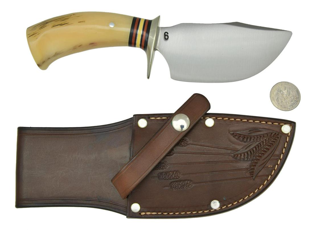 J. BEHRING JR WIDE BLADE SKINNER #6 KNIFE.: Overall: 9". Blade: 4 1/2" long & 2 1/4" wide. Blade marked on right side "6". Nickel silver hilt. Cape buffalo horn handle w/ flared butt. Mosher brown leather riveted sheath w/ cat tail motifs on fr