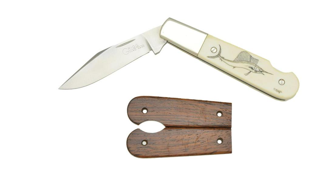 CUSTOM WALTER GRIGG SCRIMSHAW FOLDING LOCKBACK: KNIFE. Overall when locked: 6". Overall when closed: 3 1/4". Blade: 2 1/4". Walrus panels; right panel has scrimshawed marlin w/ signature "GRIGGS / 1978". UNATTACHED ACCESSORIES: walnut panels. CONDI