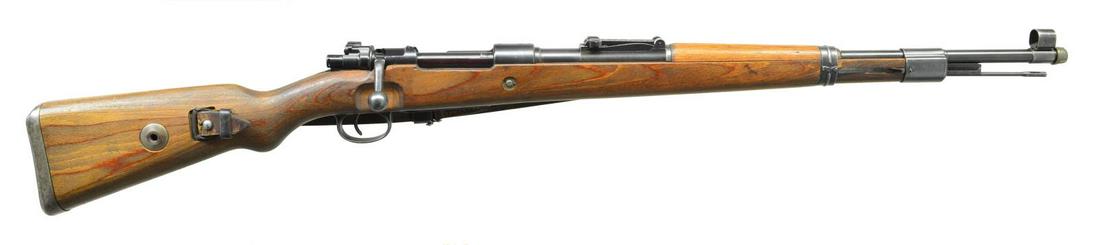 VERY FINE CONDITION WWII LATER PRODUCTION MAUSER: (BYF) 98K BOLT ACTION MILITARY RIFLE. Cal. 8mm Mauser. S# 13130c. All visible numbers match. Bbl. 23 5/8". Nice example of a mid production 98K rifle w/ lg. degree of original finish & crisp markings.