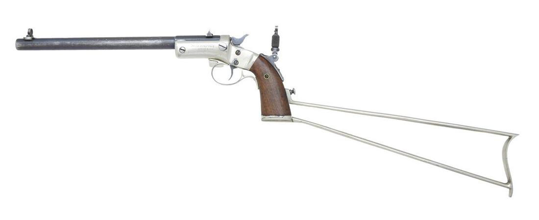 J. STEVENS INSCRIBED NO. 40-1/2 POCKET RIFLE.: Cal. 22 LR. S# 29123. Bbl. 10" w/ beech style globe & post front sight & distinctive fixed rear sight. References list tang sight for backstrap; has Lyman No.1 tang sight. Approx. 2500 mfg. 1896-1915;