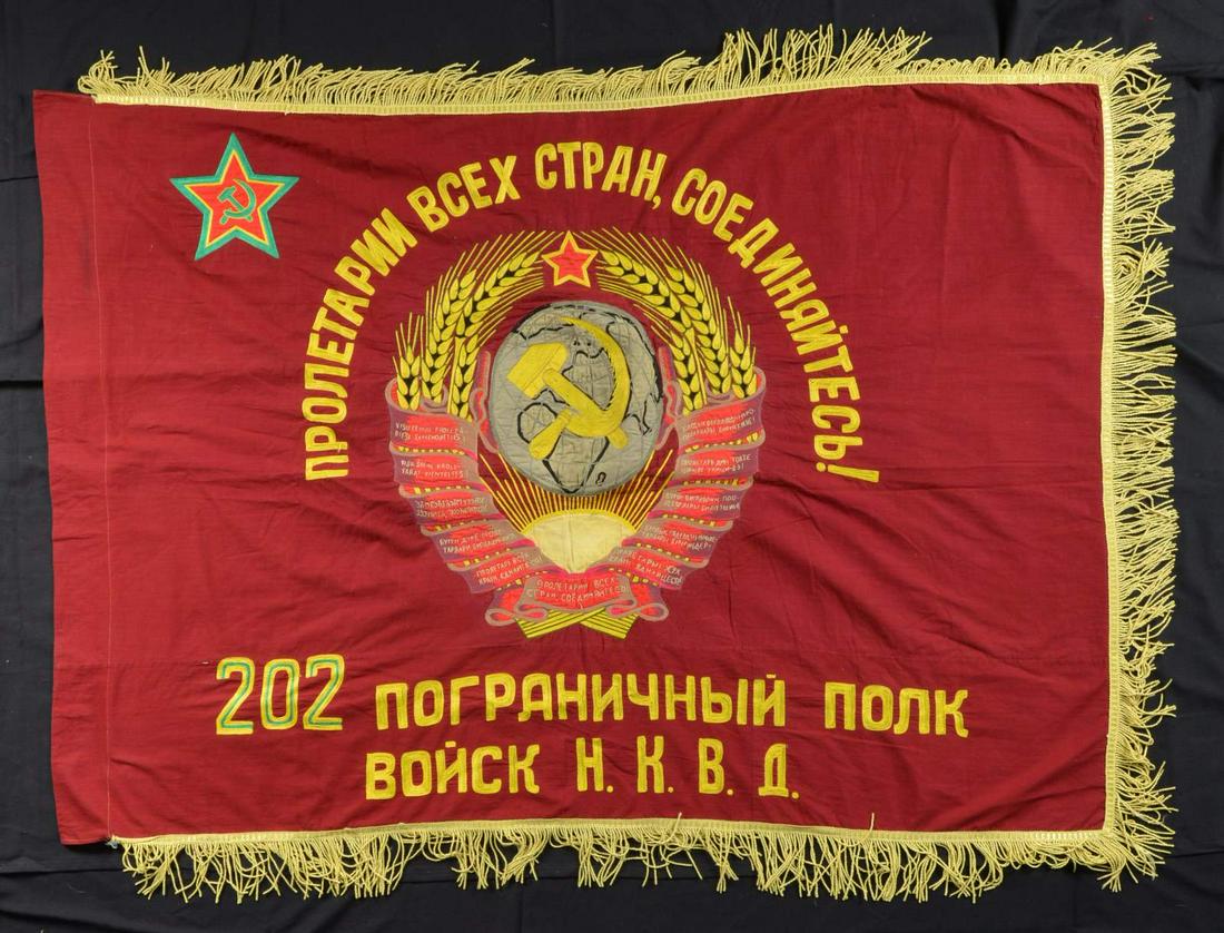 SOVIET 202ND BORDER REGIMENTAL FLAG.: 36x54” burgundy cotton field, double applique silk design, gold fringe. CONDTION: very good to fine. (02-17547-79/JS) $200-400.