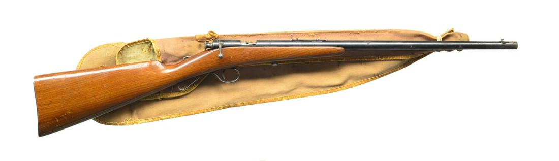 SAVAGE MODEL 1904 SINGLE SHOT RIFLE.: Cal. 22 S, L or LR. NSN. Bbl. 18". Fixed blade front & elevation adjustable rear sights. Takedown, bolt action, one piece straight grip stock. UNATTACHED ACCESSORIES: unmarked canvas case w/ broken le